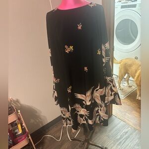 Chic Black dress with Crane Design and bell sleves